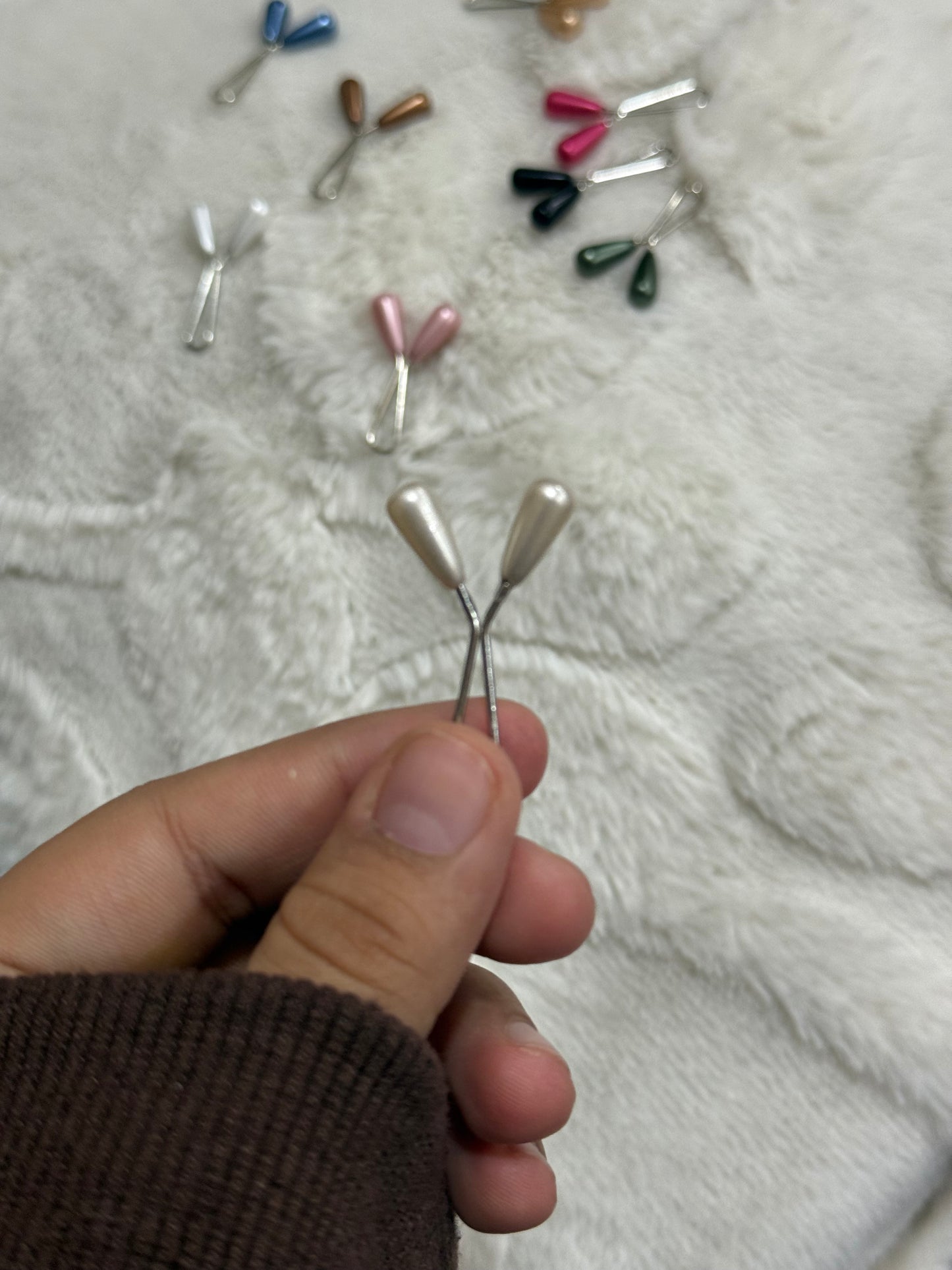Hijab pins with pearl drop charm in assorted metallic and pastel colors