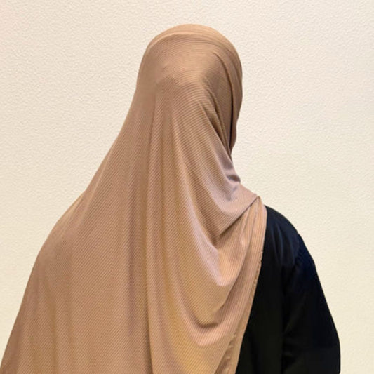 Beige Ribbed Jersey Hijab
Enhance your modest wardrobe with this premium beige ribbed jersey hijab, designed for elegance, comfort, and effortless everyday wear.
Crafted from soft ribbed jersey fabric, it offers breathable comfort, natural stretch, and graceful textured draping.