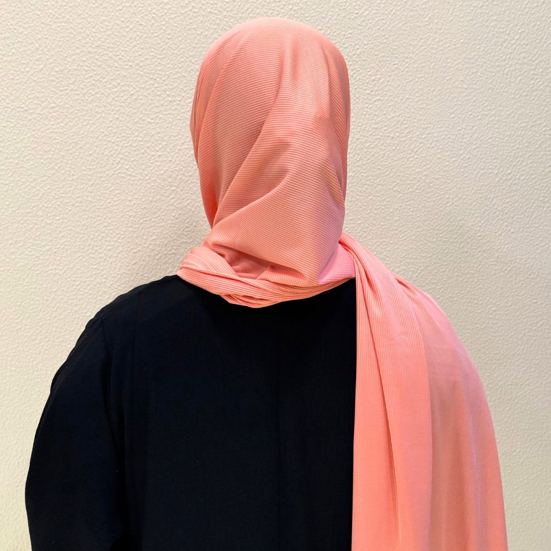 back view of pink jersey hijab showcasing full coverage, lightweight comfort, and versatile styling.