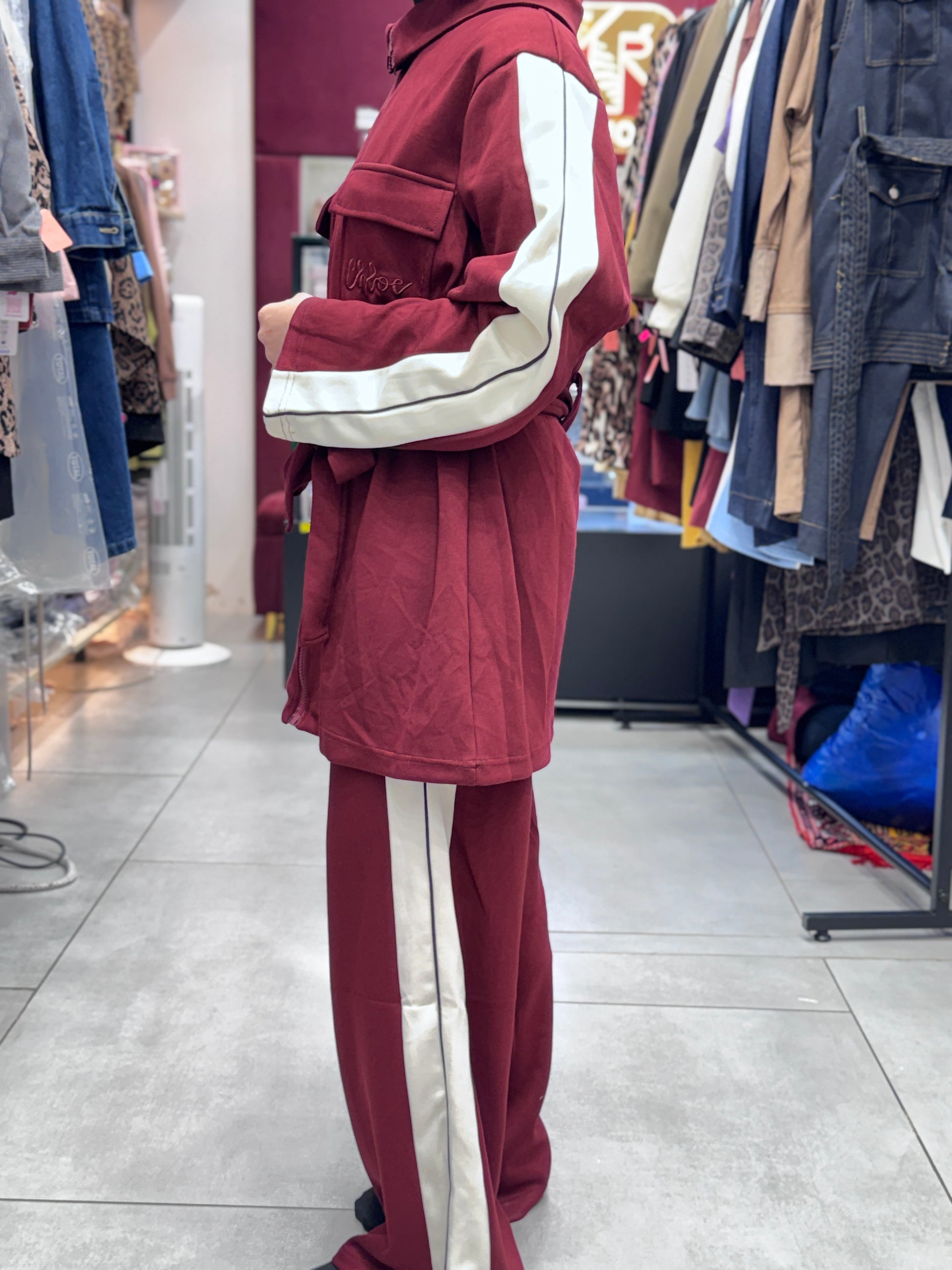 Side View Of Women’s modest 2 piece tracksuit set with hijab – sporty zip-up jacket and wide leg pants