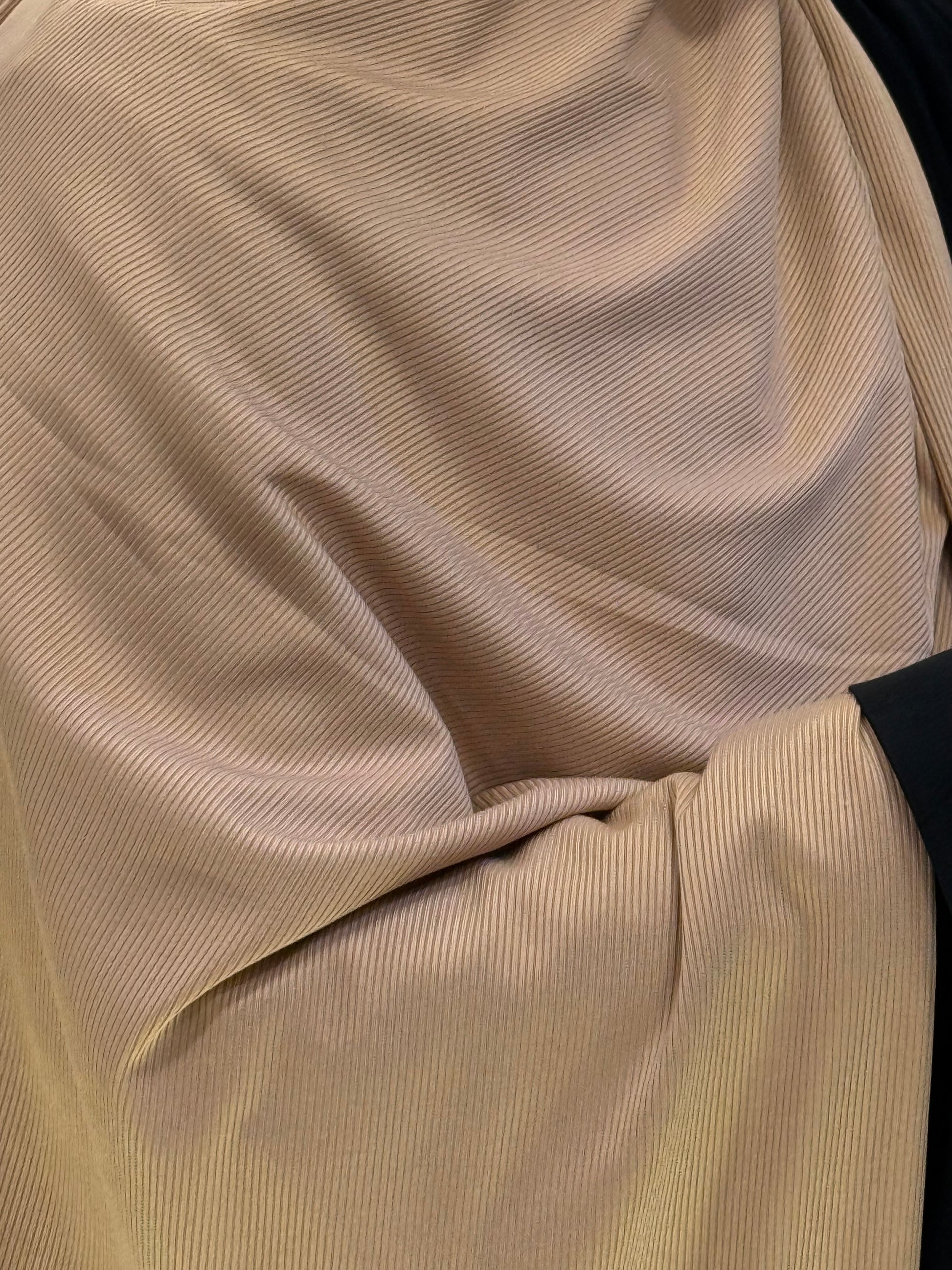 Premium beige jersey hijab product images showcasing closeup styling, back drape, and soft ribbed fabric texture for elegant modest everyday wear.