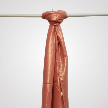 Hot pink shimmer satin hijab on display hanger