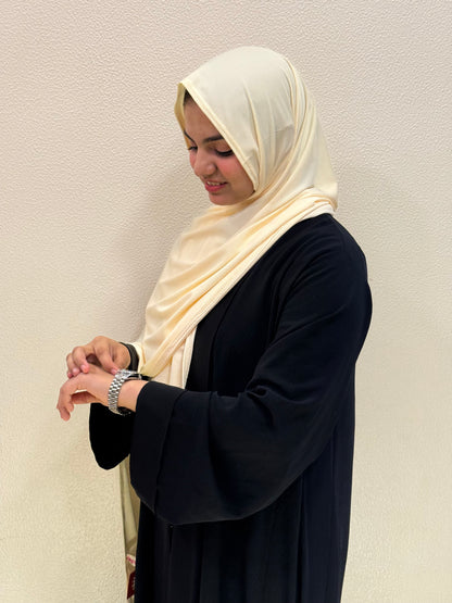 Front view of light yellow premium jersey hijab featuring smooth drape, breathable fabric, and comfortable full coverage.