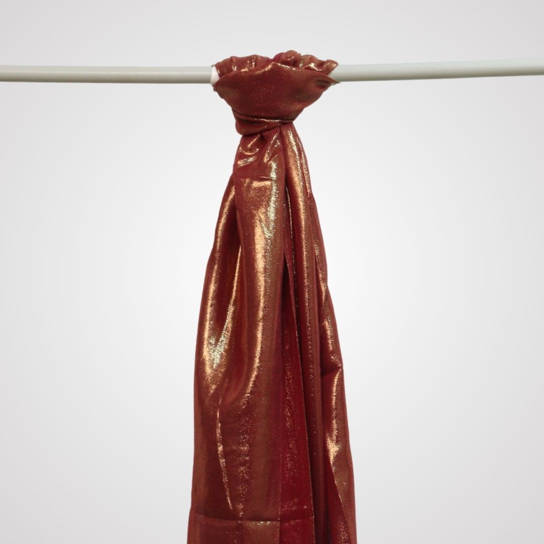 red shimmer satin hijab on display hanger