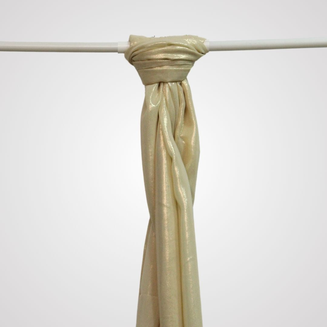 Beige shimmer satin hijab on display hanger