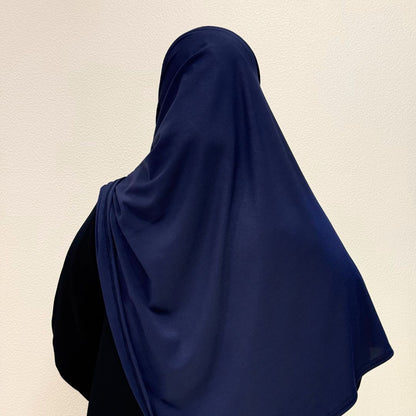 back view of navy blue jersey hijab showcasing lightweight stretch material, smooth texture, and versatile styling.