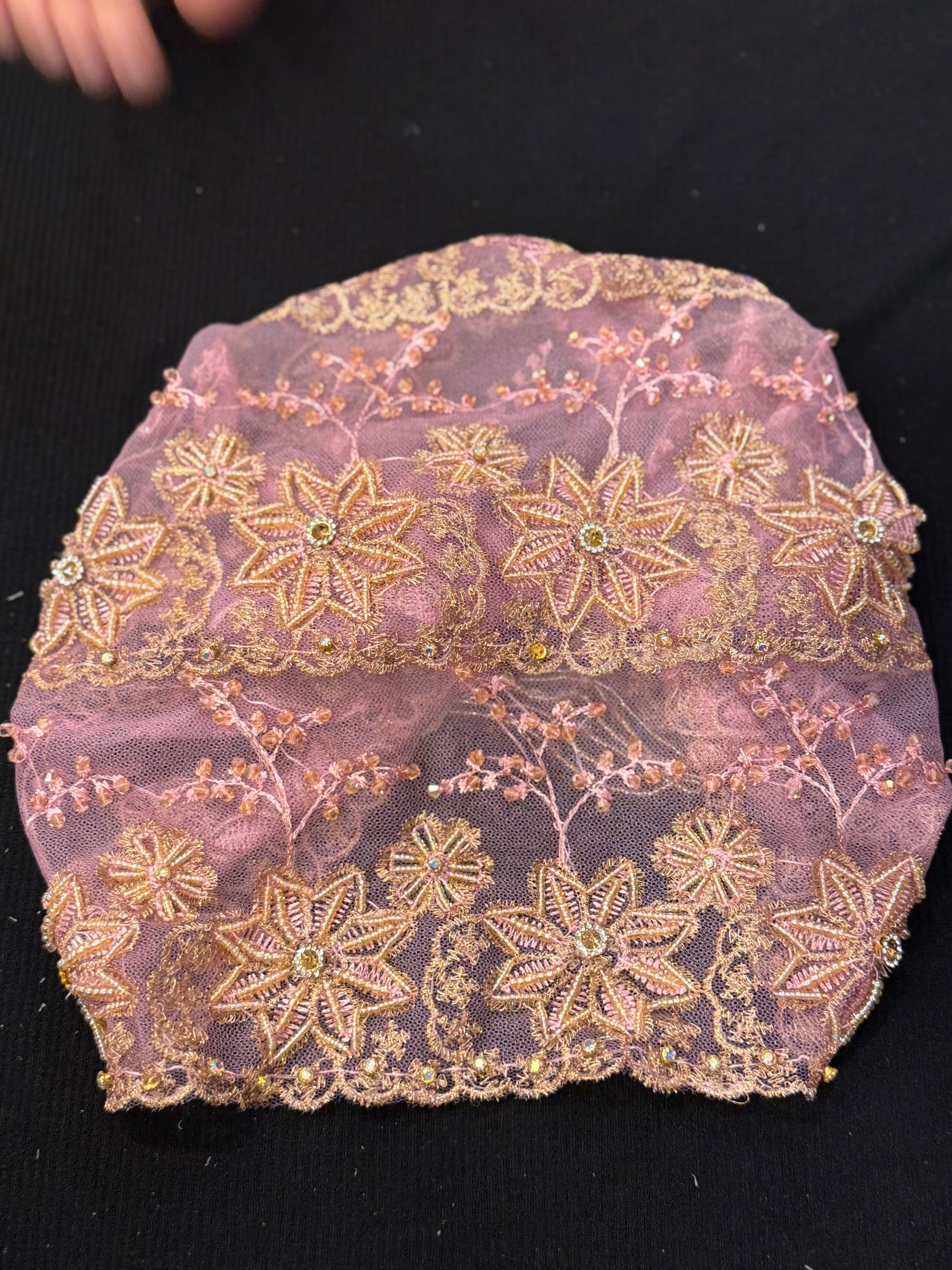 Pink and gold embellished hijab cap flat lay design