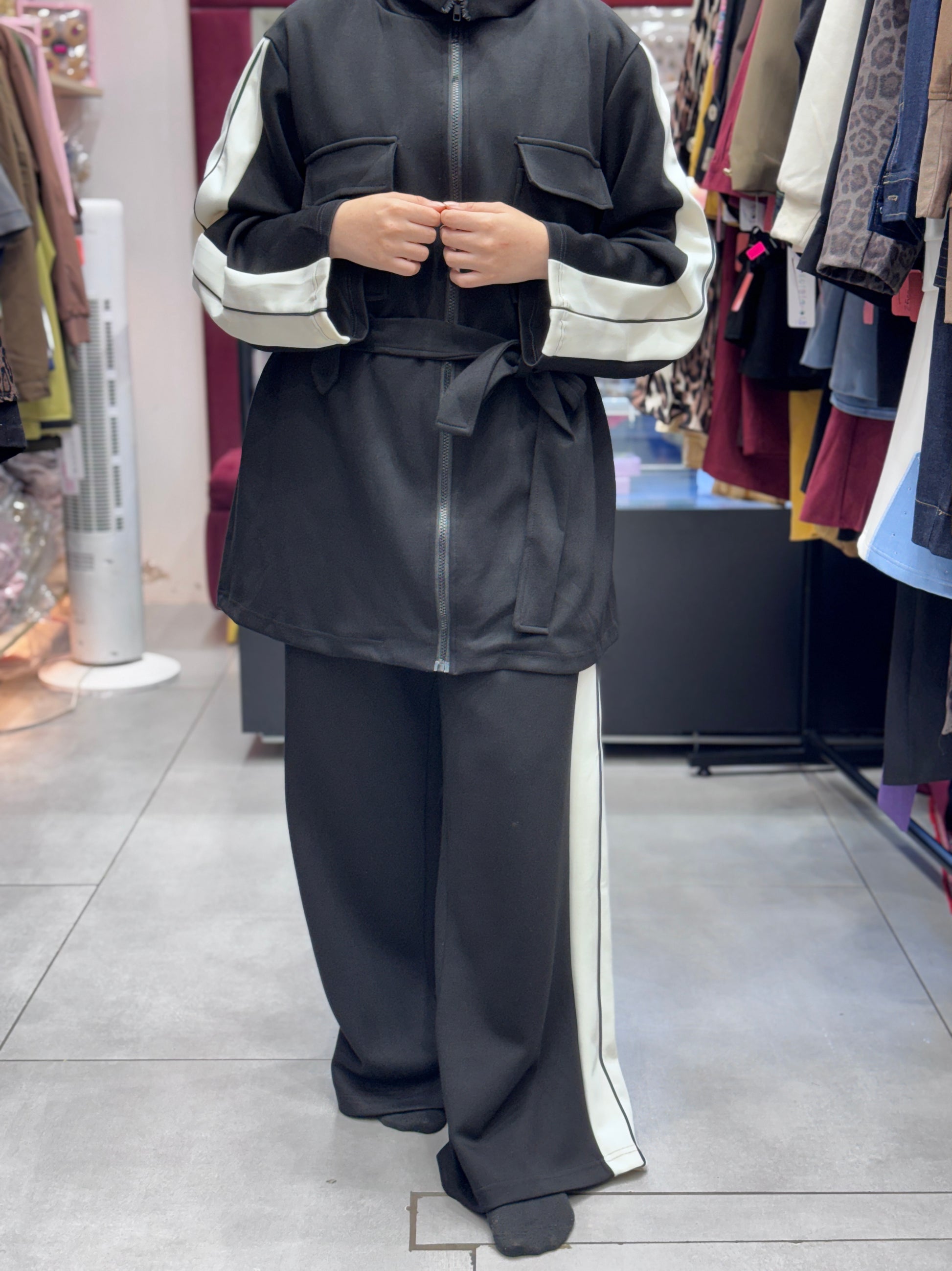 Front View Of Women’s modest 2 piece tracksuit set with hijab – sporty zip-up jacket and wide leg pants