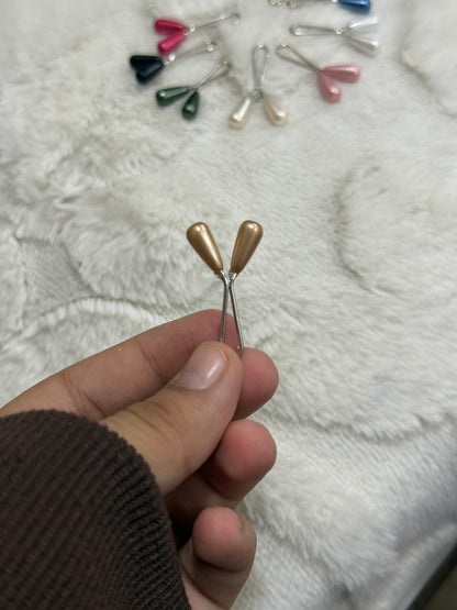Set of colorful pearl drop scarf pins in gold, pink, blue, green, black and white