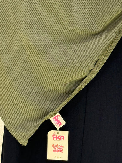Premium dark green jersey hijab close-up showcasing stretch fabric texture