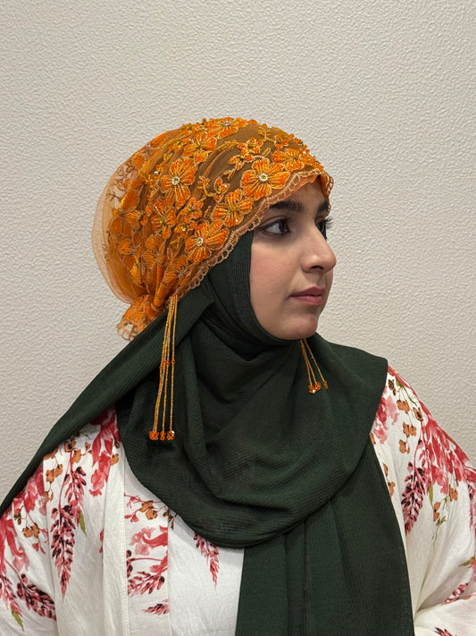 Orange party wear hijab cap side view with floral embroidery