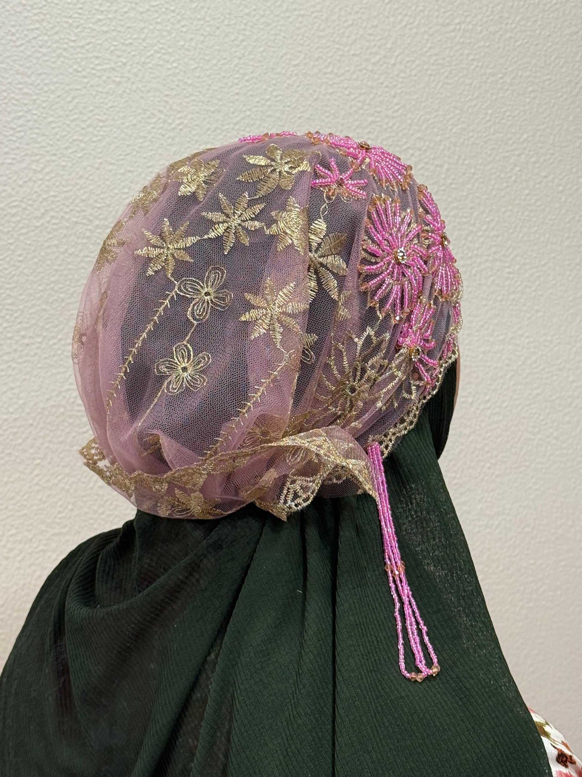 Pink and gold embroidered hijab cap angled back view with lace detailing
