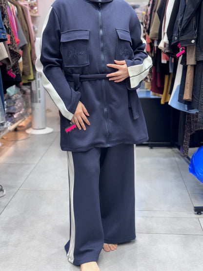 Front View Of Women’s modest 2 piece tracksuit set with hijab – sporty zip-up jacket and wide leg pants