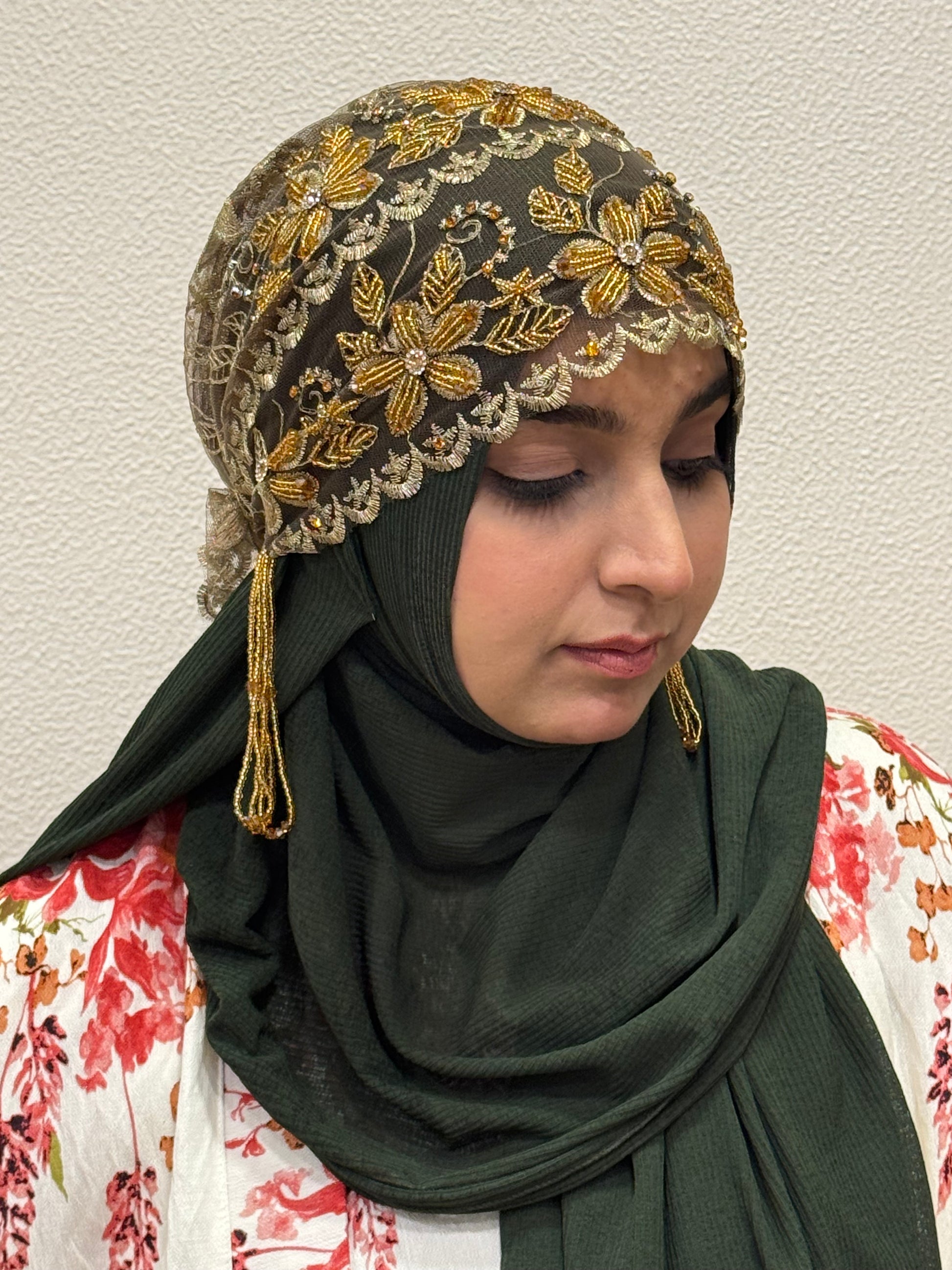 Gold party wear hijab cap closeup view with floral lace embroidery