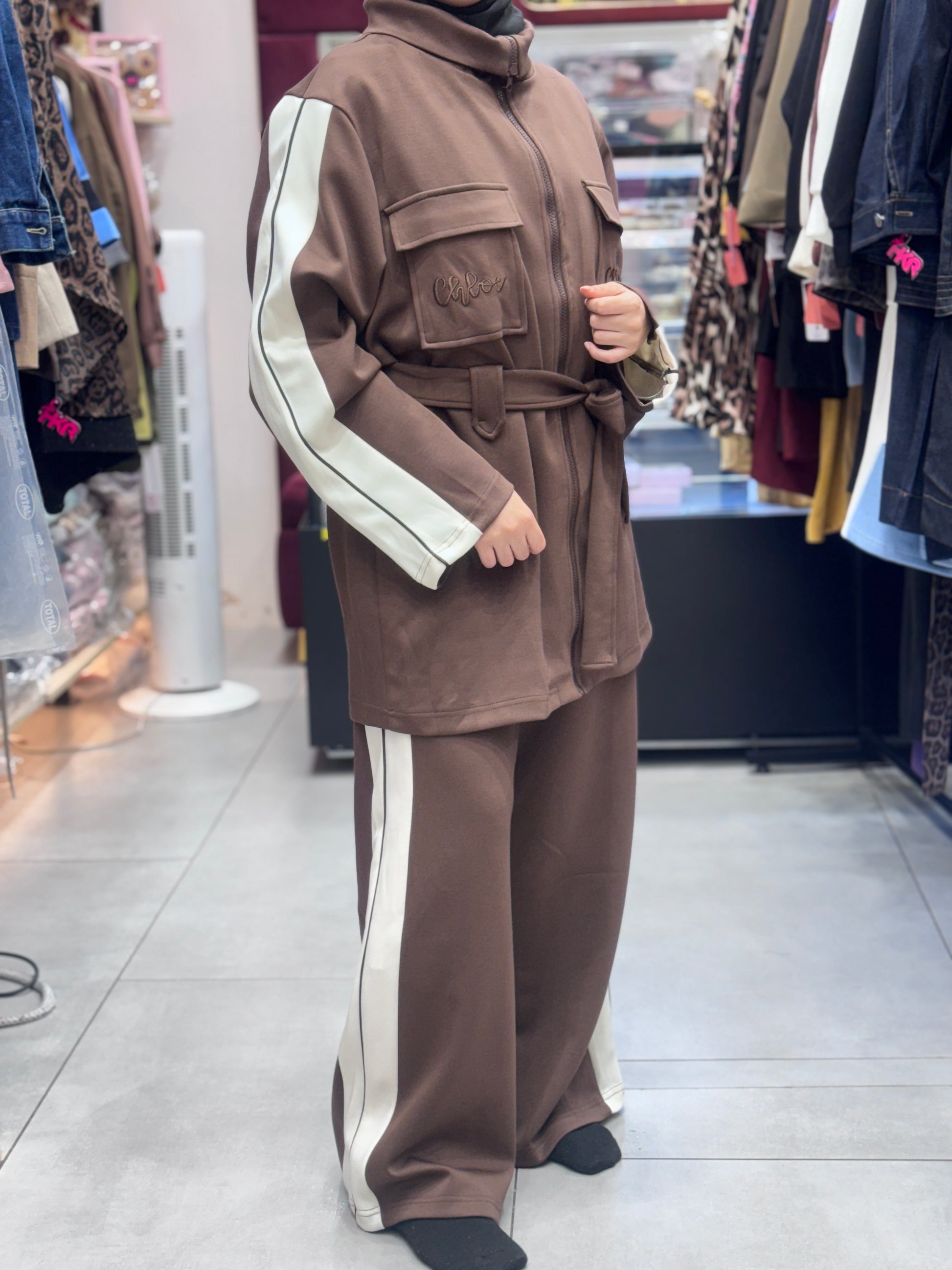 Side View Of Women’s modest 2 piece tracksuit set with hijab – sporty zip-up jacket and wide leg pants