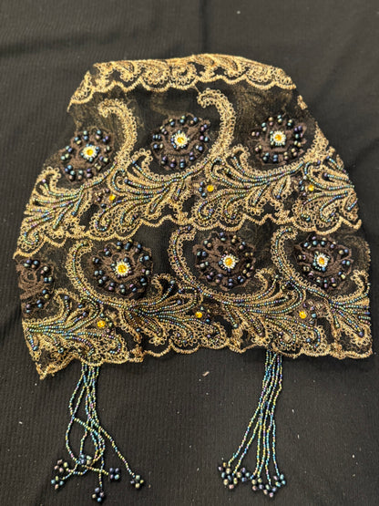 Black and gold embroidered hijab cap flat lay product display
