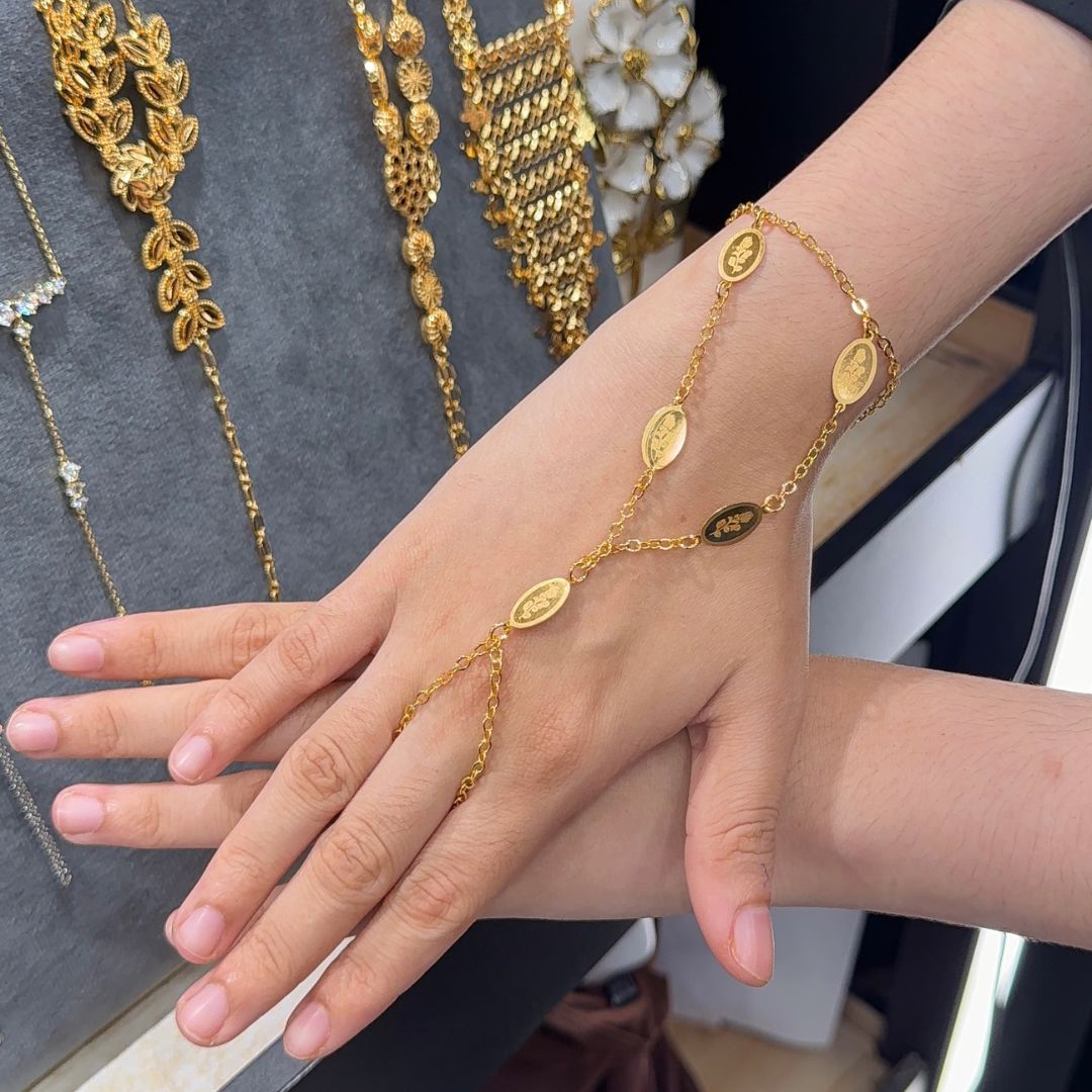 Coin style hand chain