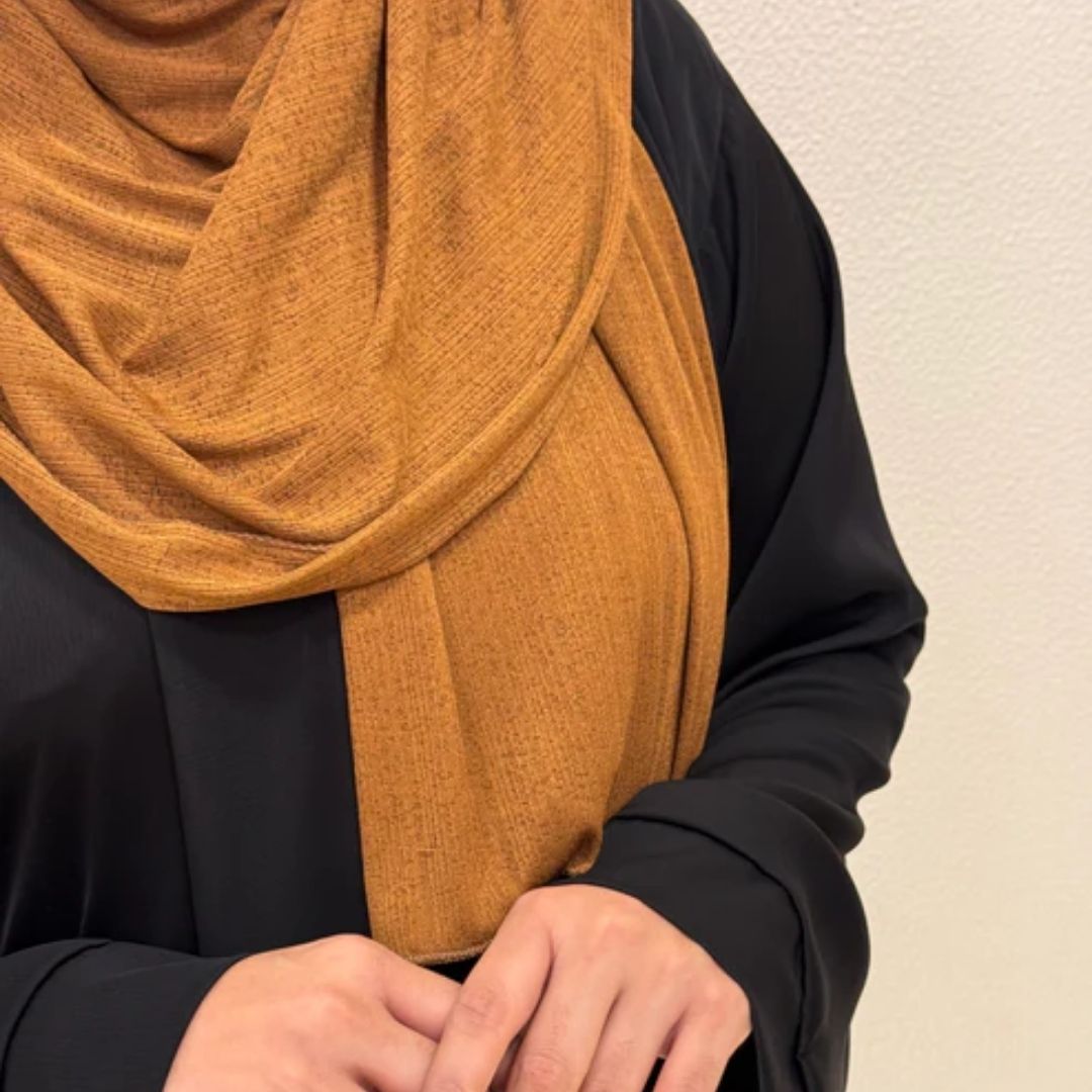 Close view of Mustard Brown Corn Jersey Hijab Premium Soft Stretch Modest Scarf Soft • Breathable • Elegant Lightweight Comfort • Everyday Style Effortless Elegance