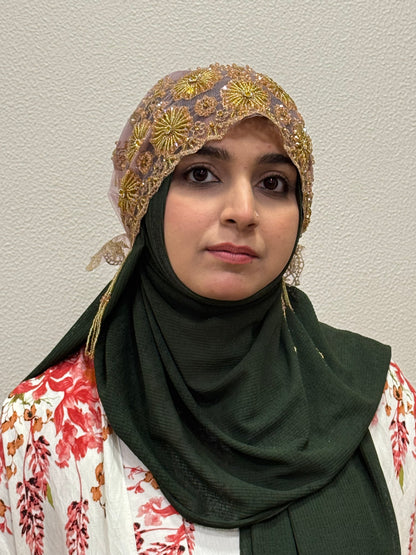 Pink and gold embroidered hijab cap front view with beadwork