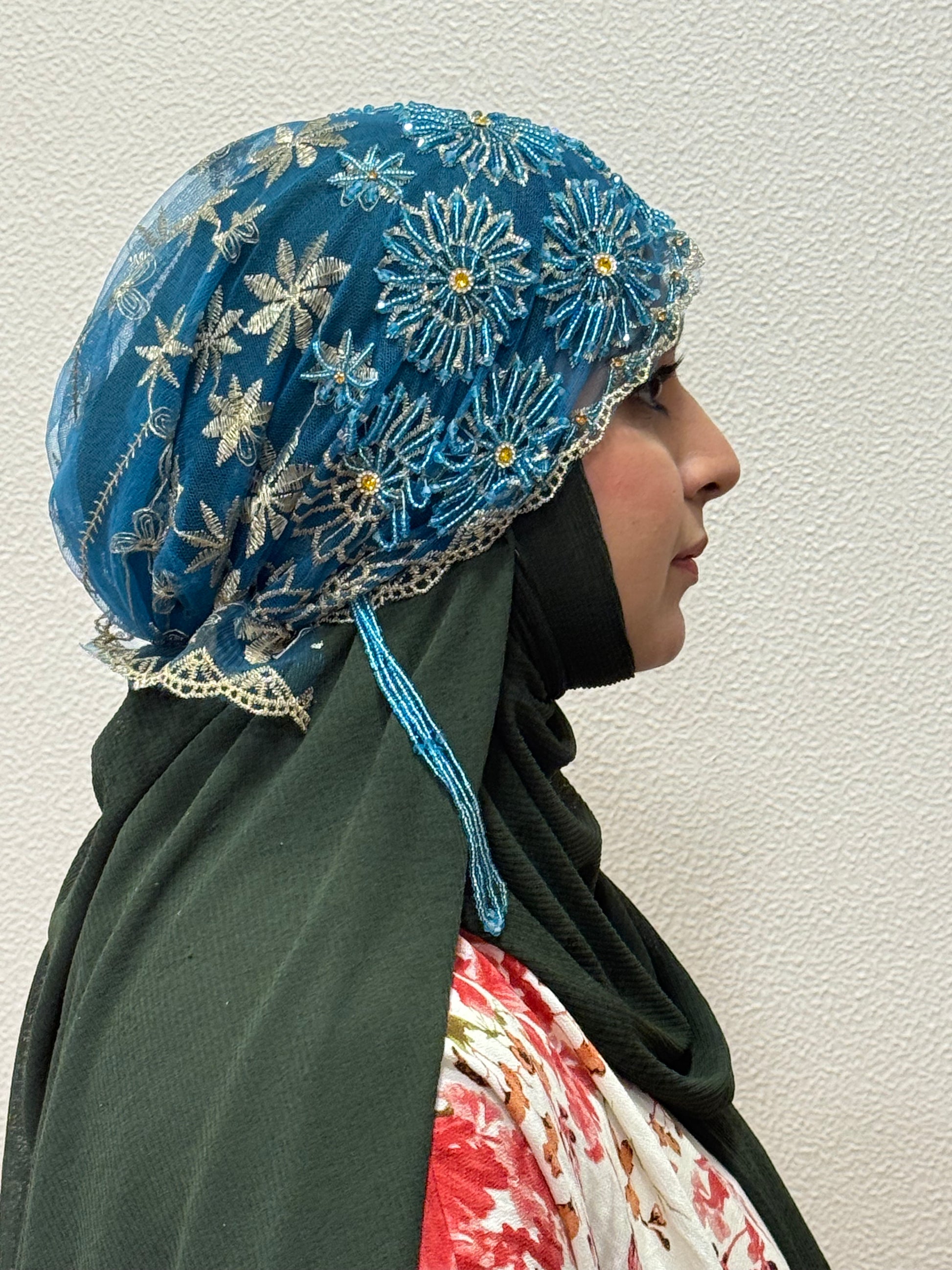 Blue embroidered hijab cap side view with lace detailing