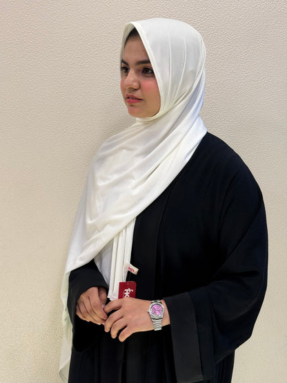 Side view of white premium jersey hijab showcasing full coverage, lightweight comfort, and versatile styling.