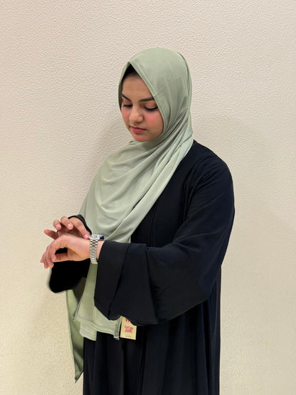 Premium soft green jersey hijab with elegant drape and breathable comfort