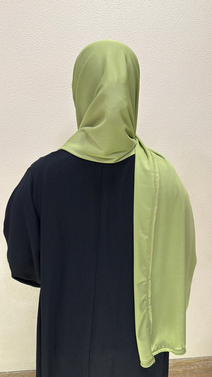 back view of light green premium jersey hijab showcasing full coverage, lightweight comfort, and versatile styling.