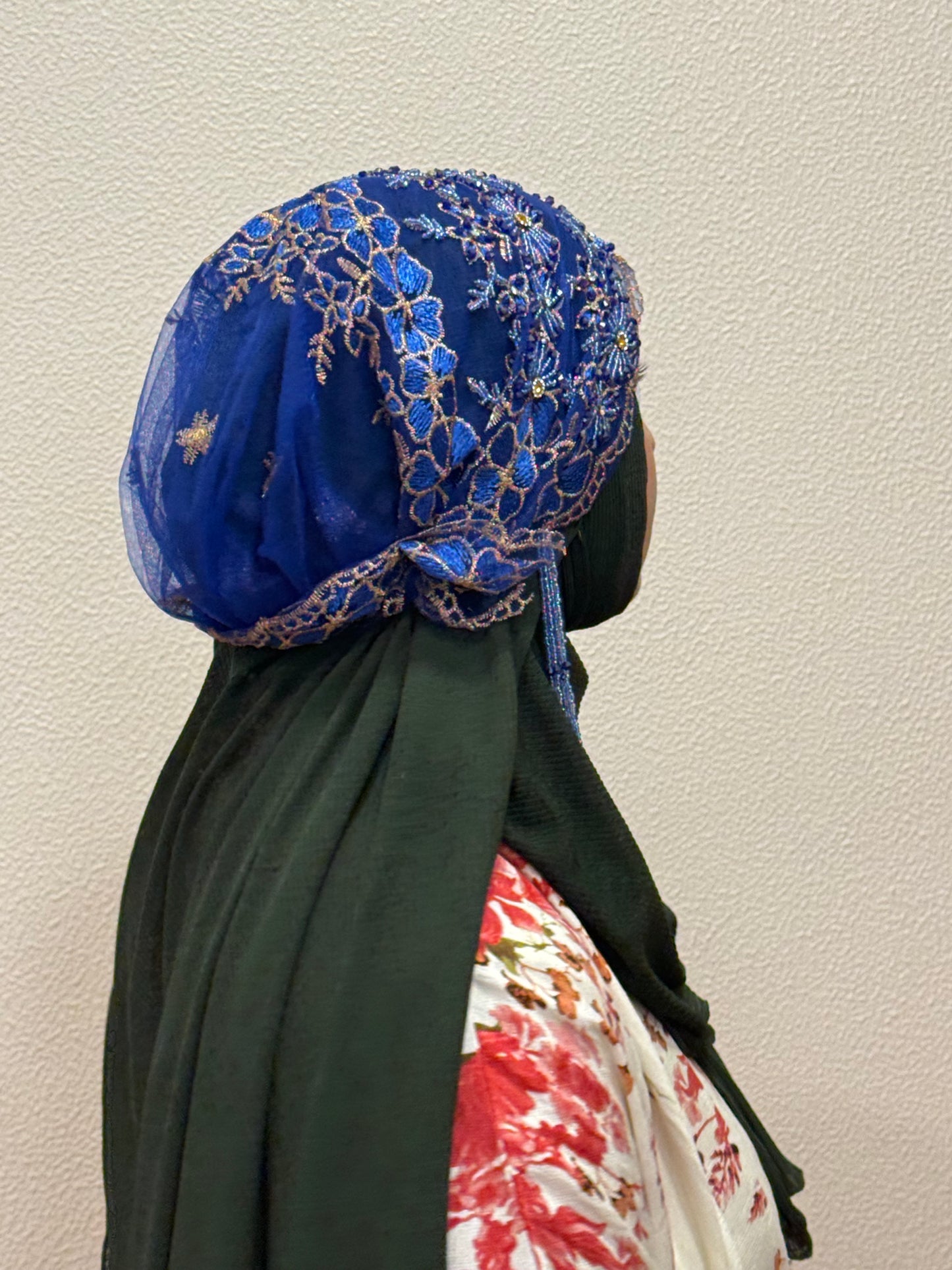 Blue embroidered hijab cap angled back view with lace detailing