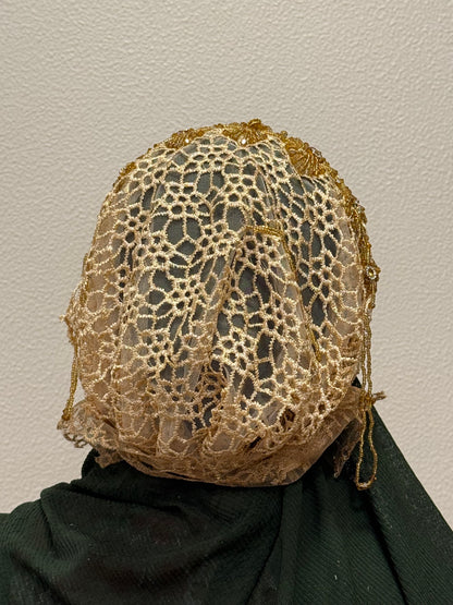 Brown and gold embroidered hijab cap back view with floral lace design