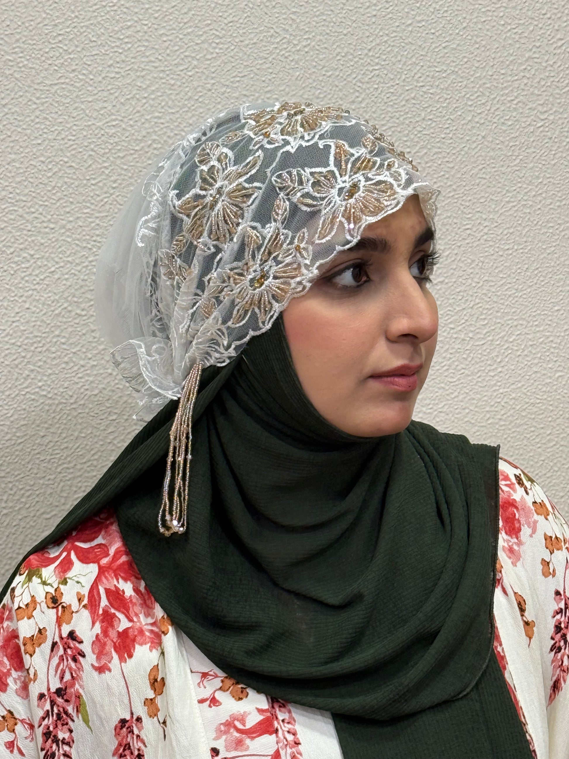 White and gold party wear hijab cap side view with floral embroidery