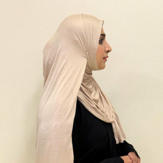 Beige Bamboo Jersey Hijab (Shade 2)

Enhance your modest wardrobe with this premium beige bamboo jersey hijab, designed for elegance, comfort, and effortless everyday wear.

Crafted from soft bamboo jersey fabric, it offers breathable comfort, natural stretch, and a graceful drape—perfect for daily wear, office looks, travel, and special occasions.