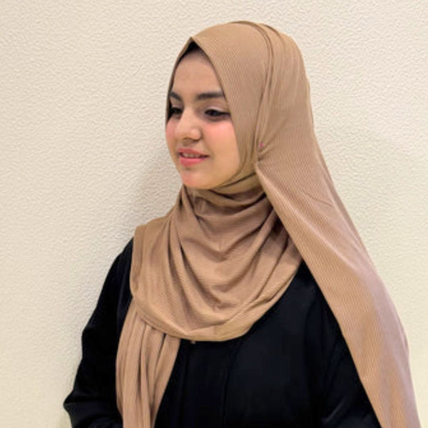 Beige Ribbed Jersey Hijab

Premium Soft Stretch Textured Modest Scarf

Soft • Breathable • Elegant

Lightweight Comfort • Everyday Style

Effortless Elegance