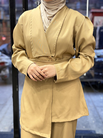 Golden Turkish 3 Piece Cord Set

Upgrade your style with this elegant golden Turkish cord set, designed for modern modest fashion. Includes top, bottom, and matching hijab for a complete look.

Made from premium Turkish fabric for soft comfort and breathable wear, perfect for daily use and special occasions.