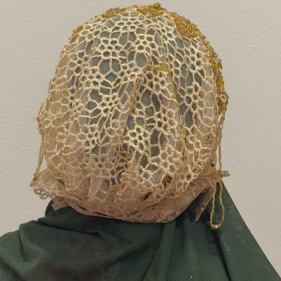 Brown and gold embroidered hijab cap back view with floral lace design