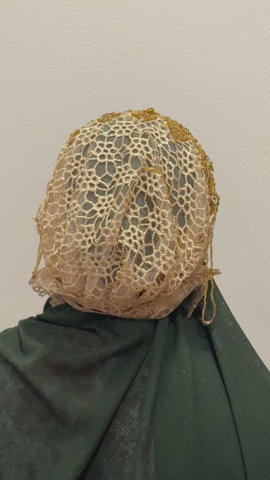 Brown and gold embroidered hijab cap back view with floral lace design