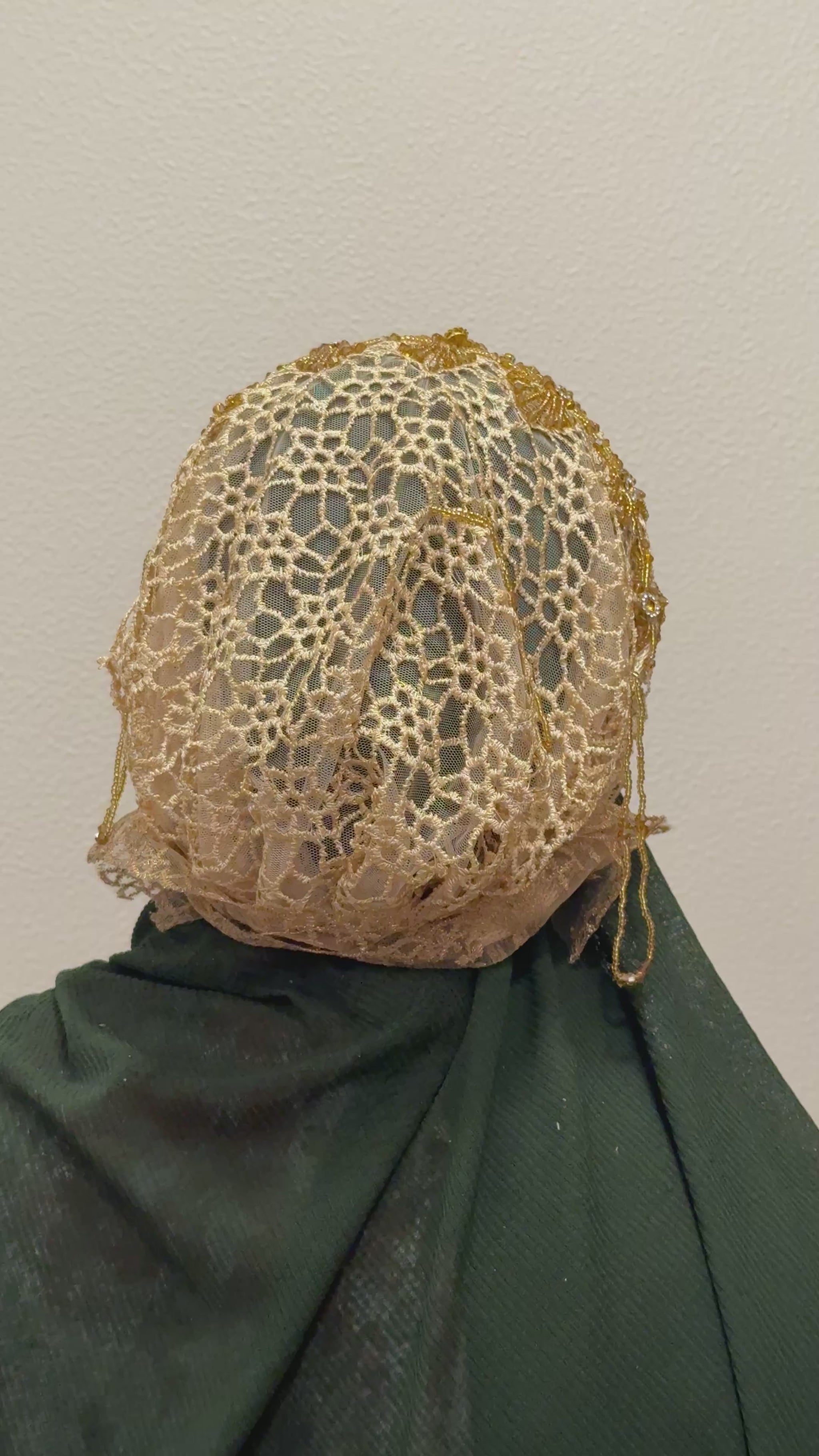 Brown and gold embroidered hijab cap back view with floral lace design